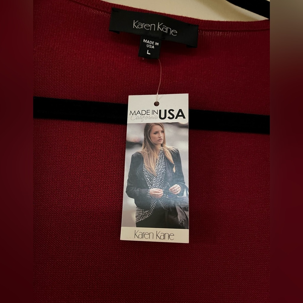 Knit red open flow front handkerchief hem cardigan